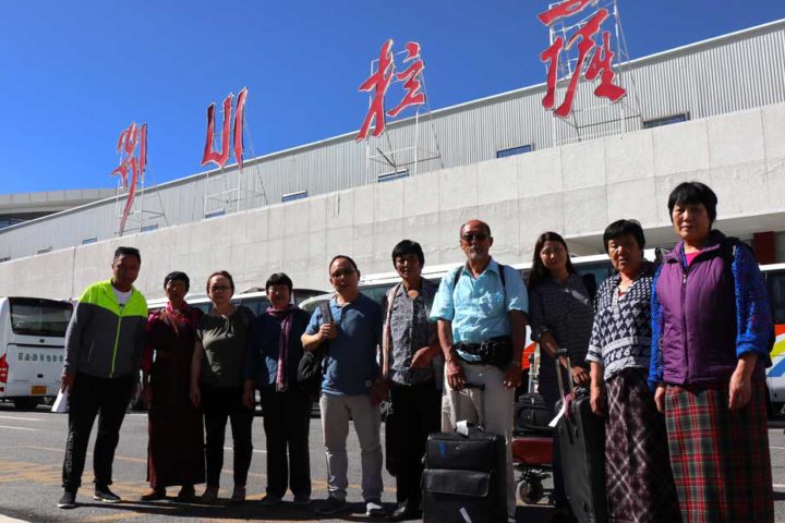 Bhutanese group received by tour guide